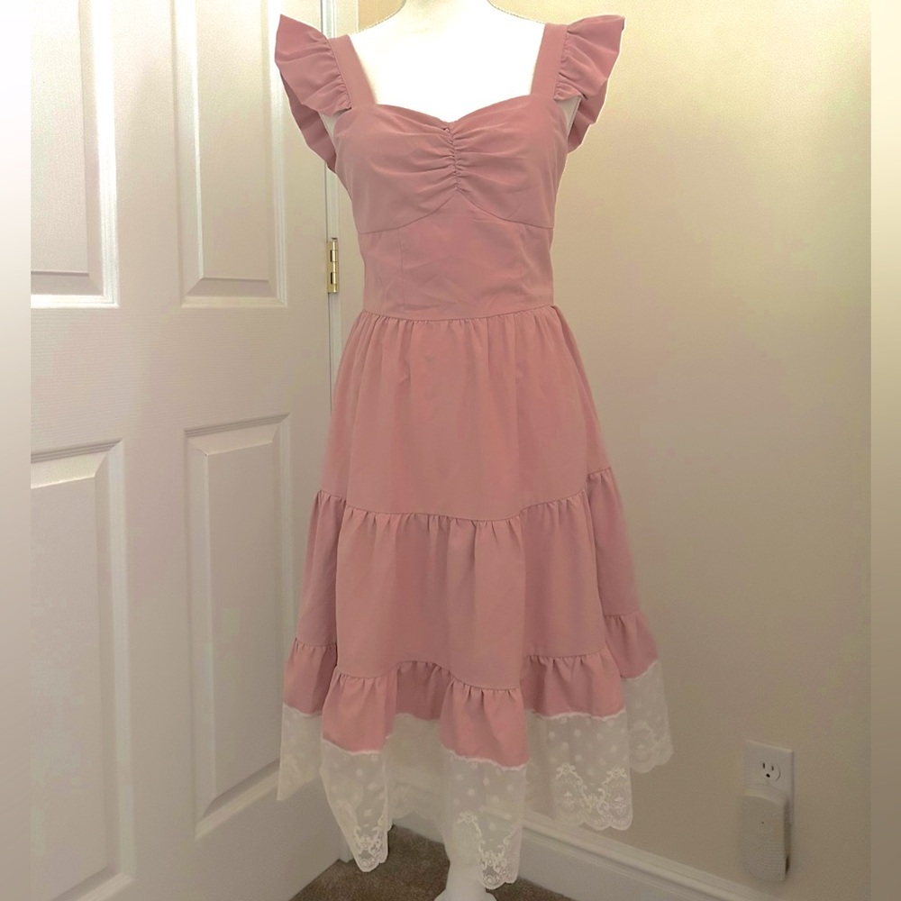 Pink ruffle sleeve twirly dress with lace